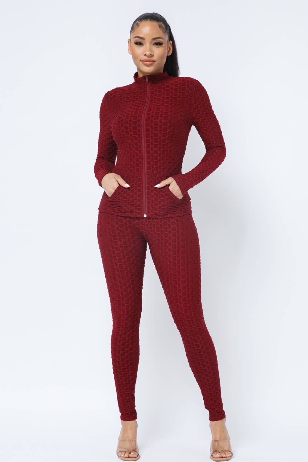 Conjunto de chaqueta y leggings con bolsillos laterales con cremallera en forma de panal