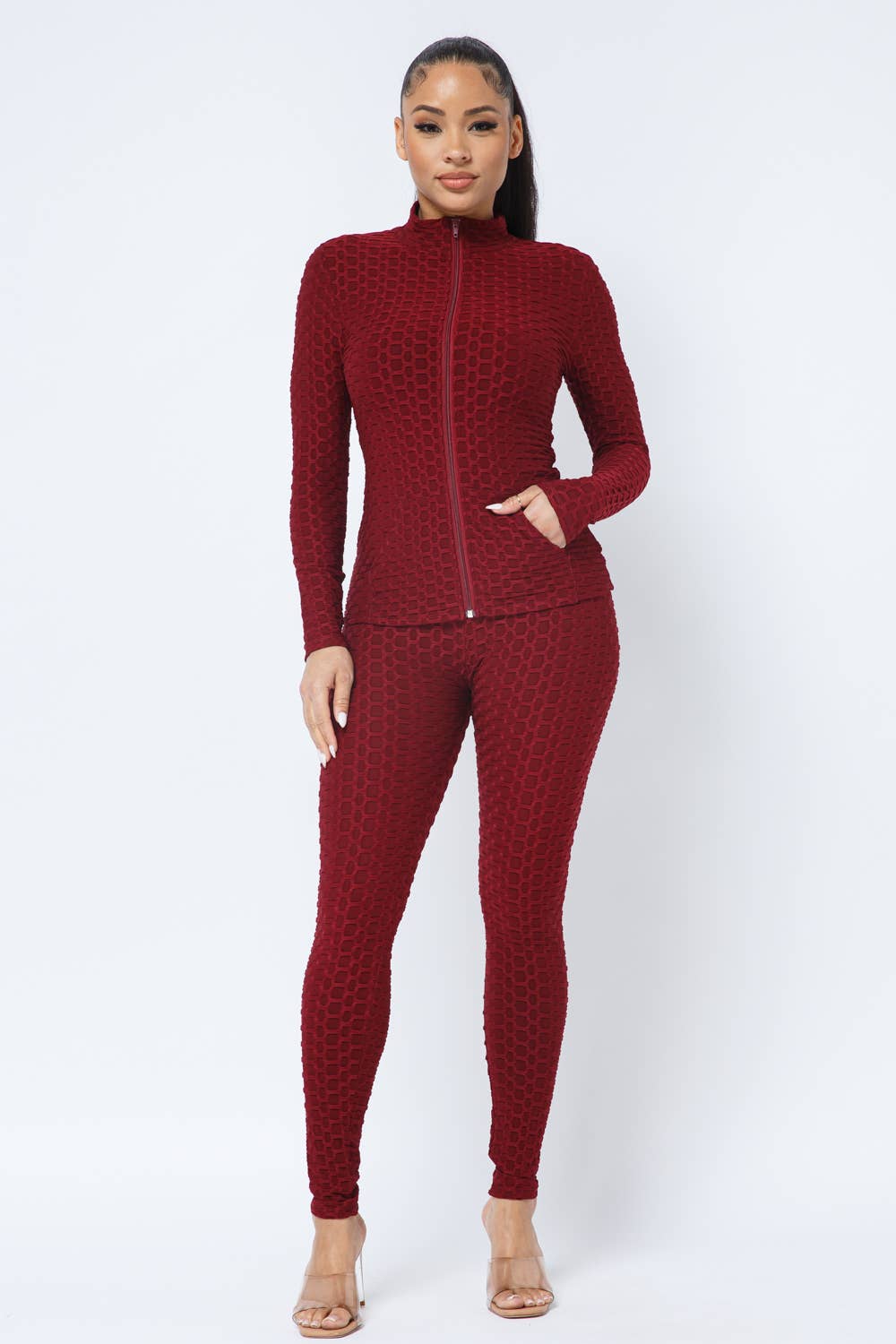 Conjunto de chaqueta y leggings con bolsillos laterales con cremallera en forma de panal