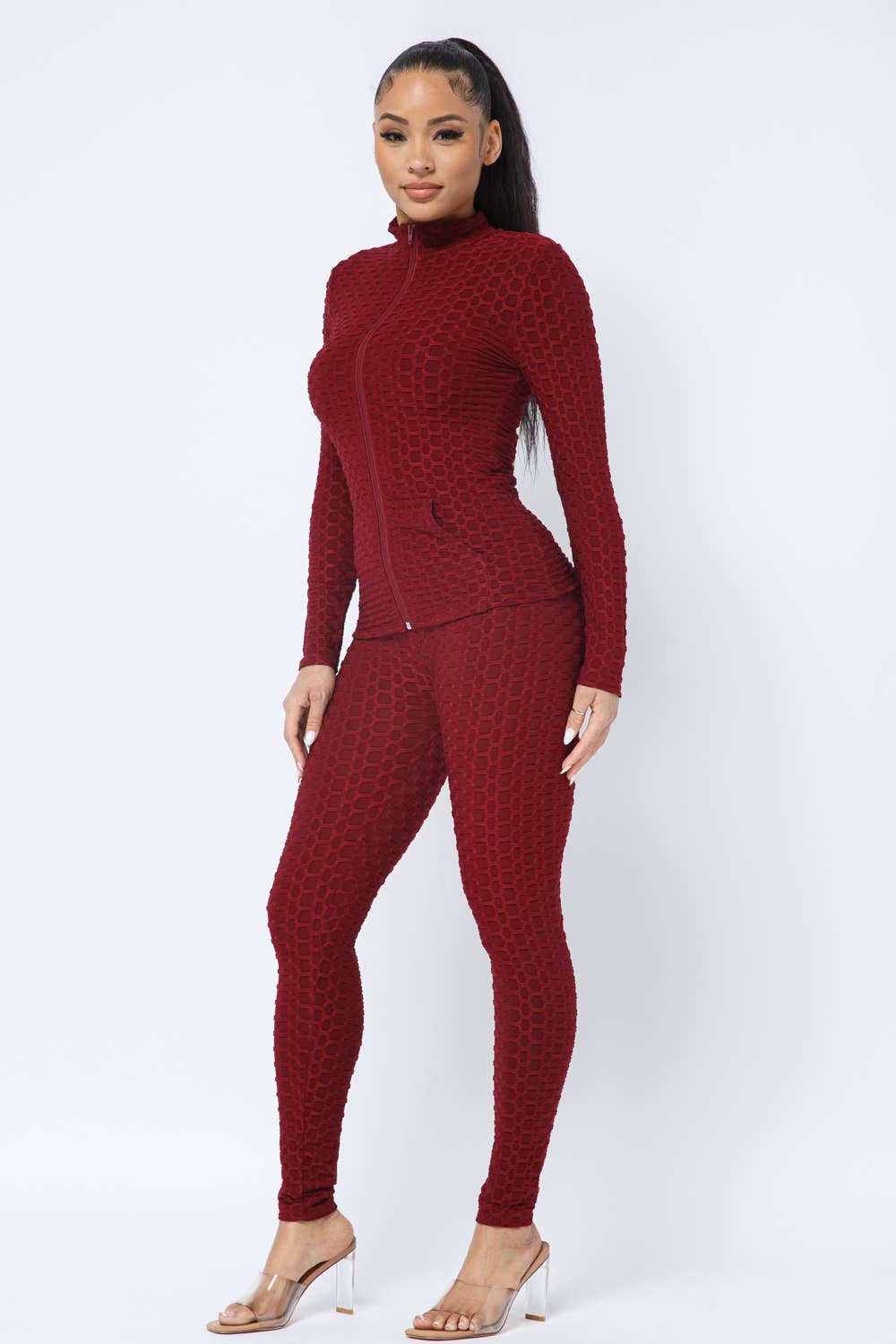 Conjunto de chaqueta y leggings con bolsillos laterales con cremallera en forma de panal